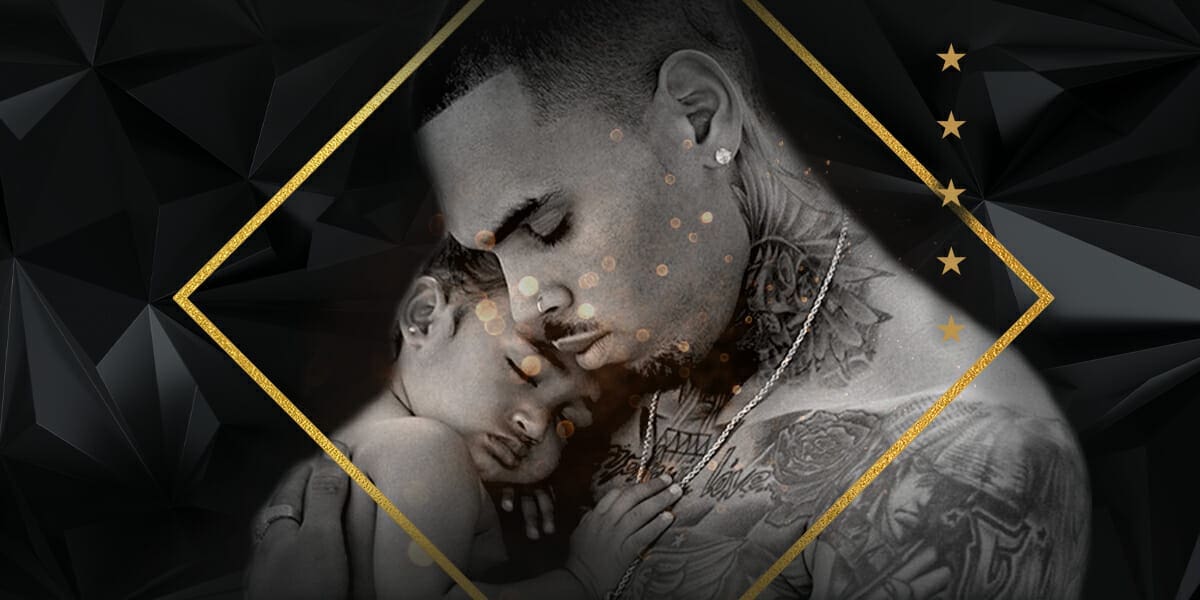 CHRIS BROWN GETS 6 MONTH OLD SON’S NAME IN INK