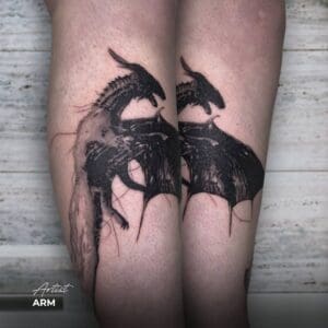 black and grey tattoo dragon