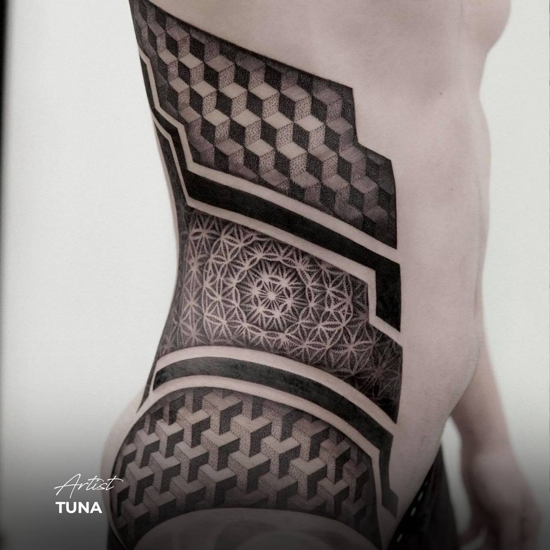 geometric tattoo black and grey ribs stomach squares optical illusion
