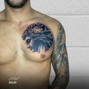 black and grey tattoo chest piece statue realism realistic face
